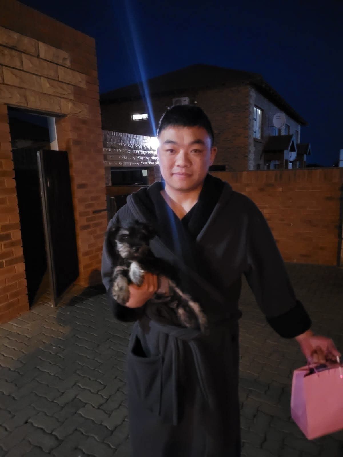 An evening handover with a gift bag from the breeder