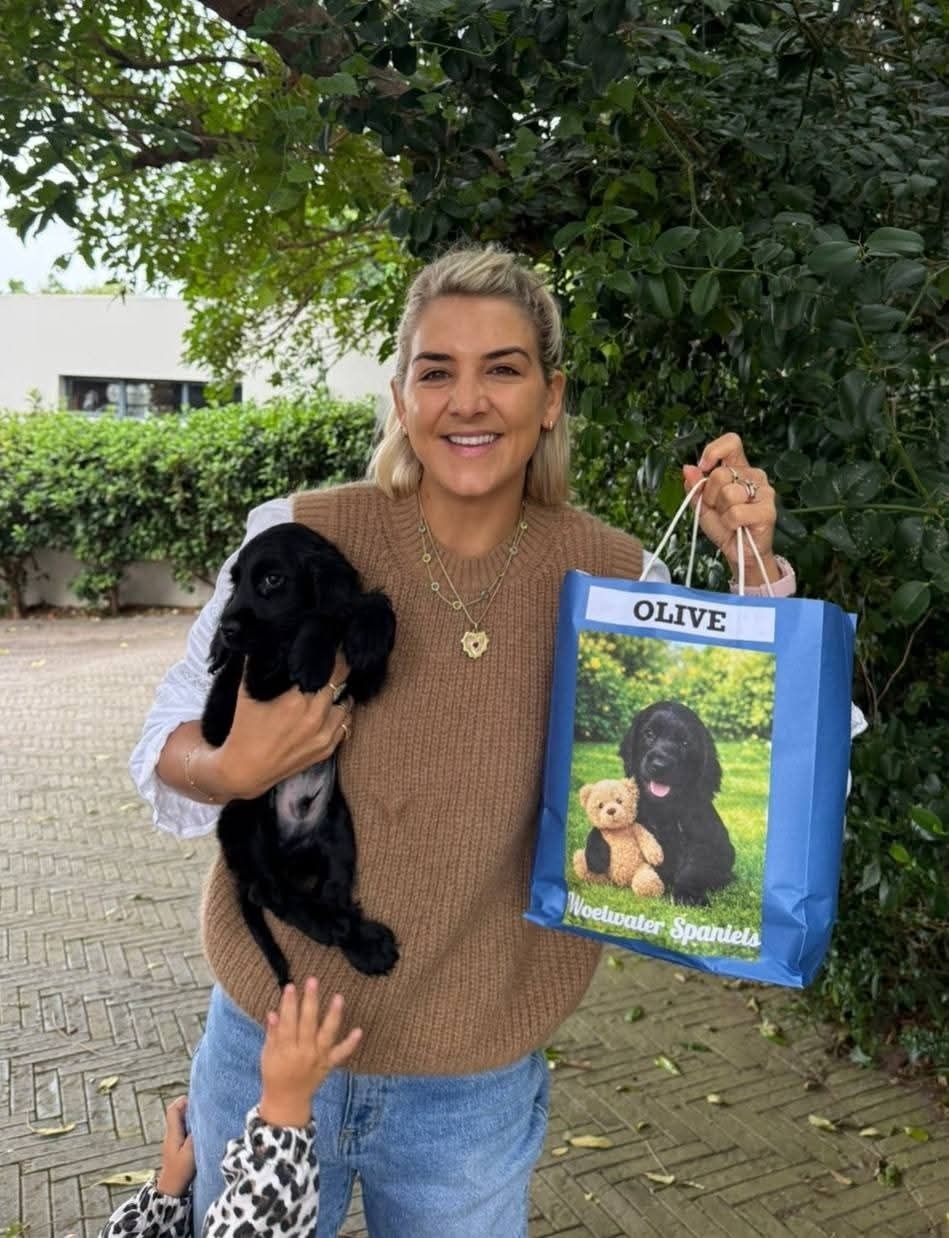 Olive delivered to her new owner with the breeder's bag